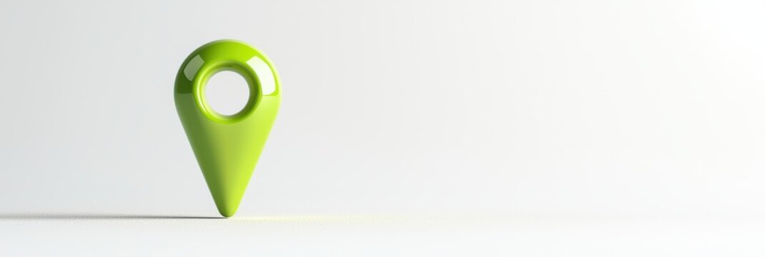 Glossy green location marker on a bright white background showcasing navigation concept