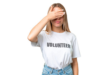 Fototapeta premium Young volunteer woman over isolated chroma key background covering eyes by hands. Do not want to see something