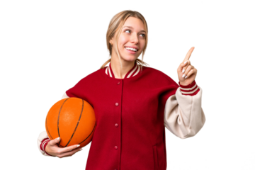 Young hispanic woman playing basketball over isolated white background pointing up a great idea