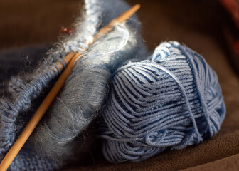 knitted handicraft, beautiful knitting pattern, handicraft concept, making clothes by hand