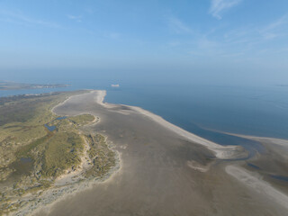 aerial drone view of the beach at Texel, The Netherlands, dunes and sand.