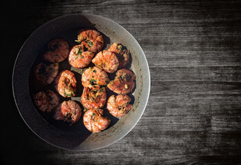 Stewed praws without head in a pan