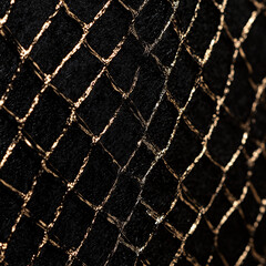 Fototapeta premium A black background with intricate gold thread patterns, creating a luxurious, textured, and elegant design, ideal for premium branding or artistic projects.