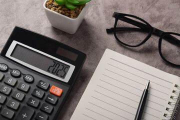 Budget concept for the next year. Calculator 2025 isolated on a dark gray background