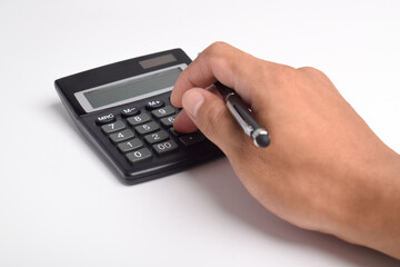 Man hands holding and using a calculator isolated on a white background
