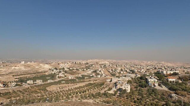 A stunning view from Herodium, overlooking the Judean Mountains and surrounding settlements, capturing the beautiful landscape and ancient ruins of this World Heritage Site. ISrael.