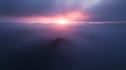 Fototapeta premium Mountain Peak Sunset Over Foggy Landscape