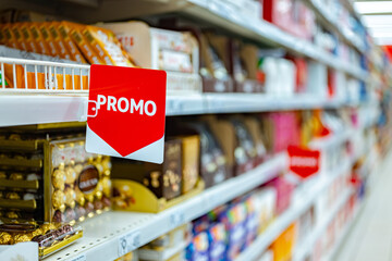 Promo sign at a shelf in a supermarket