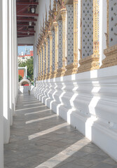 A minimalist-style image of a traditional Thai temple, showcasing clean architectural lines and a simple yet elegant design.