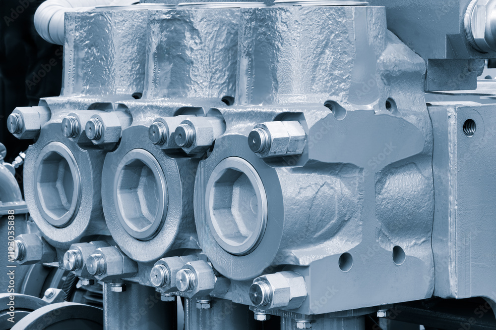 Poster a machine with three cylinders and a bolt on the front. the cylinders are silver and the bolt is bla