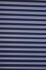 Obraz premium Abstract Background with Horizontal Line Texture. Abstract background featuring wavy horizontal lines in gray and blue tones. Perfect for design projects, presentations, or as a texture for graphic