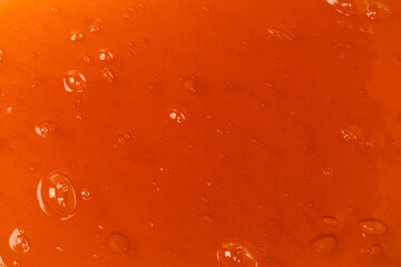 Red slime toy isolated background.