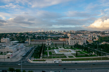 Obraz premium Jerónimos monastery in lisbon, portugal, with surrounding gardens and cityscape