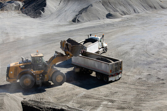 Front end loader loading a truck in mine