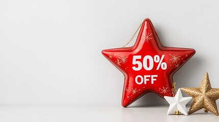 Christmas Red star with 50% off sale decoration on a light background.