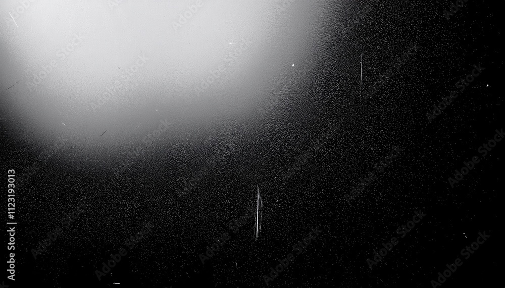 Aufkleber macro shot of a textured black surface with light reflections and a central scratch, highlighting fi