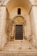 Fototapeta premium Entrance door of The Basilica of Saint Nicholas ( San Nicola ) in Bari, Roman Catholic Church in region of Apulia