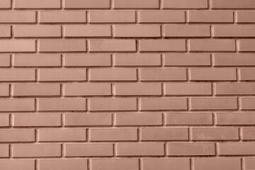 Fototapeta premium Brick wall texture background neatly arranged. Demonstrating color of 2025 year mocha mousse