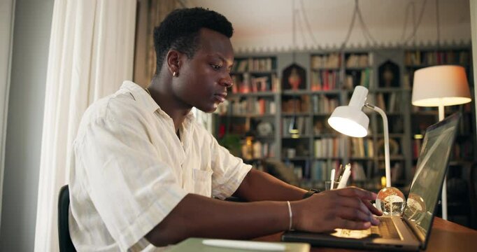 Education, college student or typing on laptop in home for research proposal, masters thesis or project deadline. Learning, black man or writing online report for university assignment or application