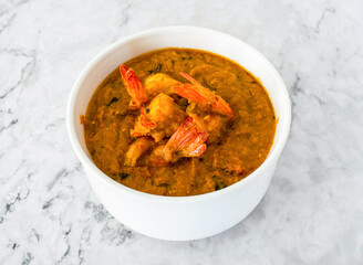 Prawn Curry served in bowl isolated on grey background side view of Pakistan and Indian food