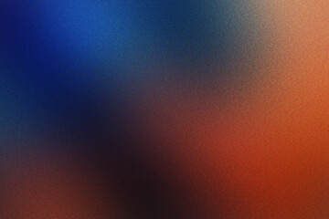 "Blurry, warm-toned gradient featuring deep orange and navy blue hues in soft transition."