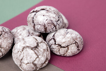 Chocolate cookies on a colored background. Selective focus. 