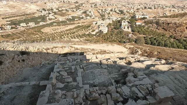 top view of the fragmented remains of Herod's tomb at Herodium, Israel. An iconic historical and archaeological site set amidst the scenic Judean desert.