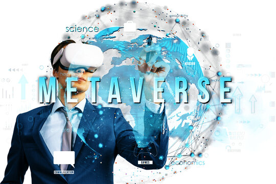 Businessman wearing virtual reality headset, pointing to futuristic digital display with global map and text, on white background, concept of metaverse
