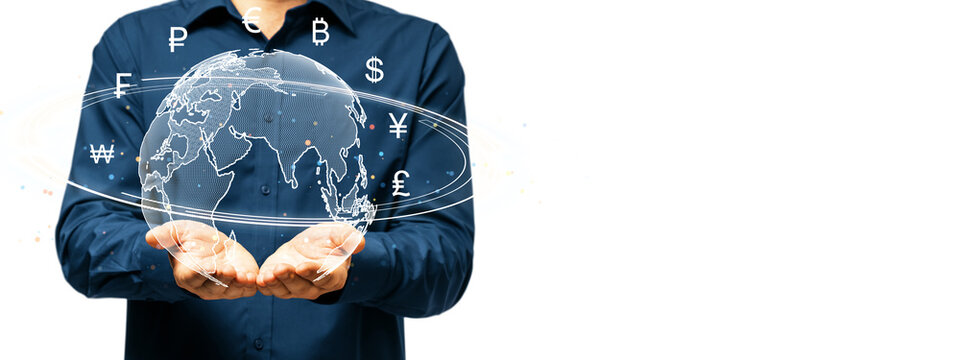 A person in a blue shirt holding a digital globe with various global currency symbols, floating on a white background, symbolizing finance exchange