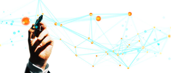 Hand holding pen creating abstract blue and orange network structure on white background,...