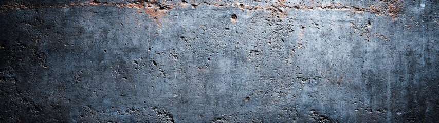 Fototapeta premium Dark Concrete Wall Texture, a close-up view of a textured surface featuring deep shadows, rugged imperfections, and a sense of industrial strength and minimalism.