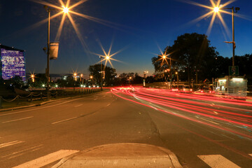 Long Exposure of Car Tail Lights Trailing from Right to Left at Dusk