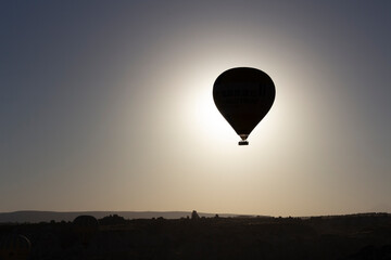 Hot air balloons take off at dawn in Cappadocia