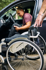 Obraz premium Woman Helping Man With Disability