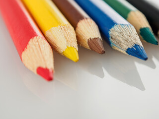 A macro shot of colored pencils showing the vibrant hues and details that inspire creativity and the art of drawing