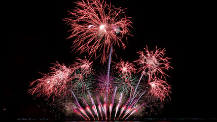 International fireworks display above the sea surface in Pattaya, Chonburi, Thailand.