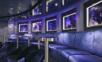 Purple and silver piano bar lounge onboard modern cruiseship cruise ship liner
