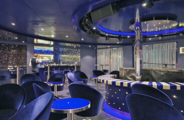 Purple and silver piano bar lounge onboard modern cruiseship cruise ship liner