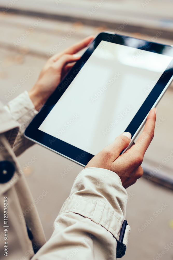 Poster hipster girl holding modern touch pad device with copy space display for your internet advertisement