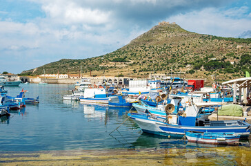Fishing boats in harbour on the island Favignana, Sicily.