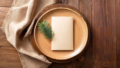 Rustic holiday invitation on wooden plate with evergreen accent, menu for restaurant