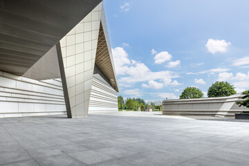 Empty brick floor and modern city buildings background