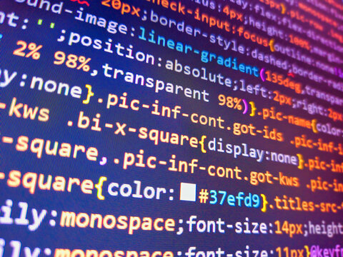 Software development monitor. Elearning concept with internet related words. Developer display with source code. Abstract background for search job. Abstract modern virtual computer script.