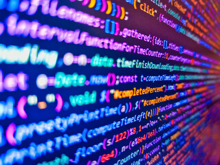 Background of program code. Computer html code on screen. Web programming with compressed css code. Programming concept. Programming code on monitor screen. Software developer coding screen.