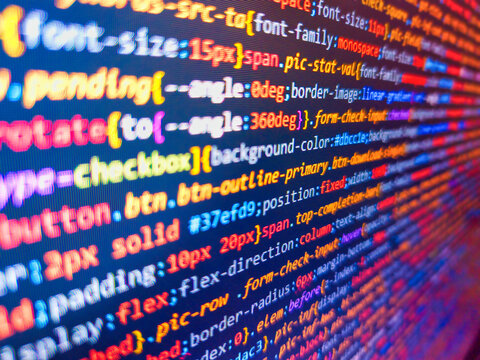 Statistic concept. Software developer screen. Python code computer screen. Monitor with stock data, closeup. Stock market graph and ticker with blue screen for stock exchange analysis.