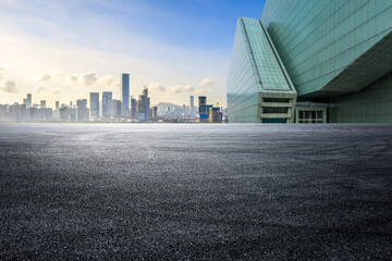 Empty asphalt road and cityscape with skyline in modern city