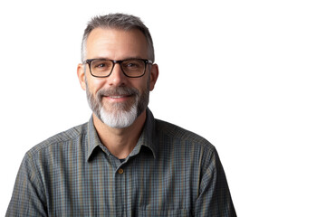 Obraz premium A smiling man with glasses and a beard, dressed in a plaid shirt, posing against a white isolated background.