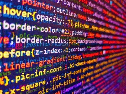 Colorful code background. Web dewelopment. Programming code with black background. Computer html code on screen. Developer work. Background of program code. Code background. Blue color.