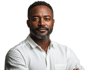 Fototapeta premium Confident man with a beard wearing a white shirt, posing with arms crossed against a white isolated background.