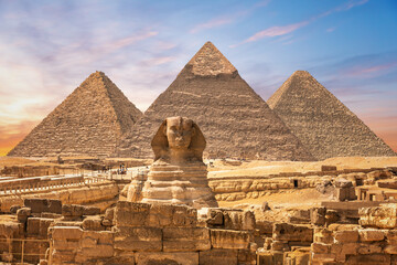 The Great Sphinx next to the Pyramids of Egypt in the sands of Giza desert